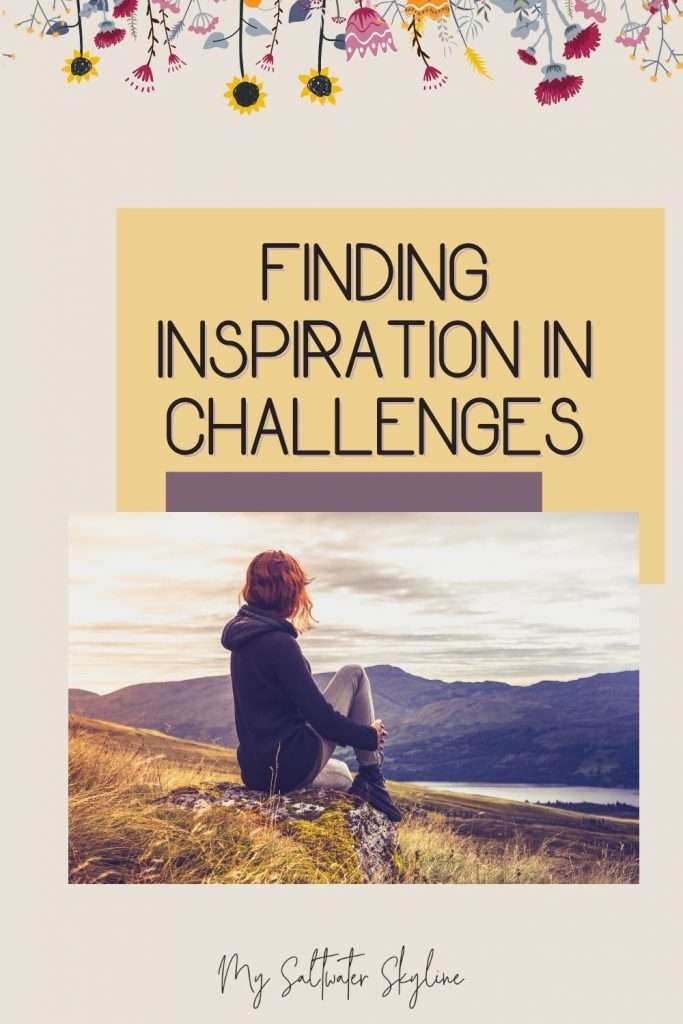 woman-sitting-on-hillside-contemplating-wearing-warm-jacket-inspiration-in-challenges-blog-post