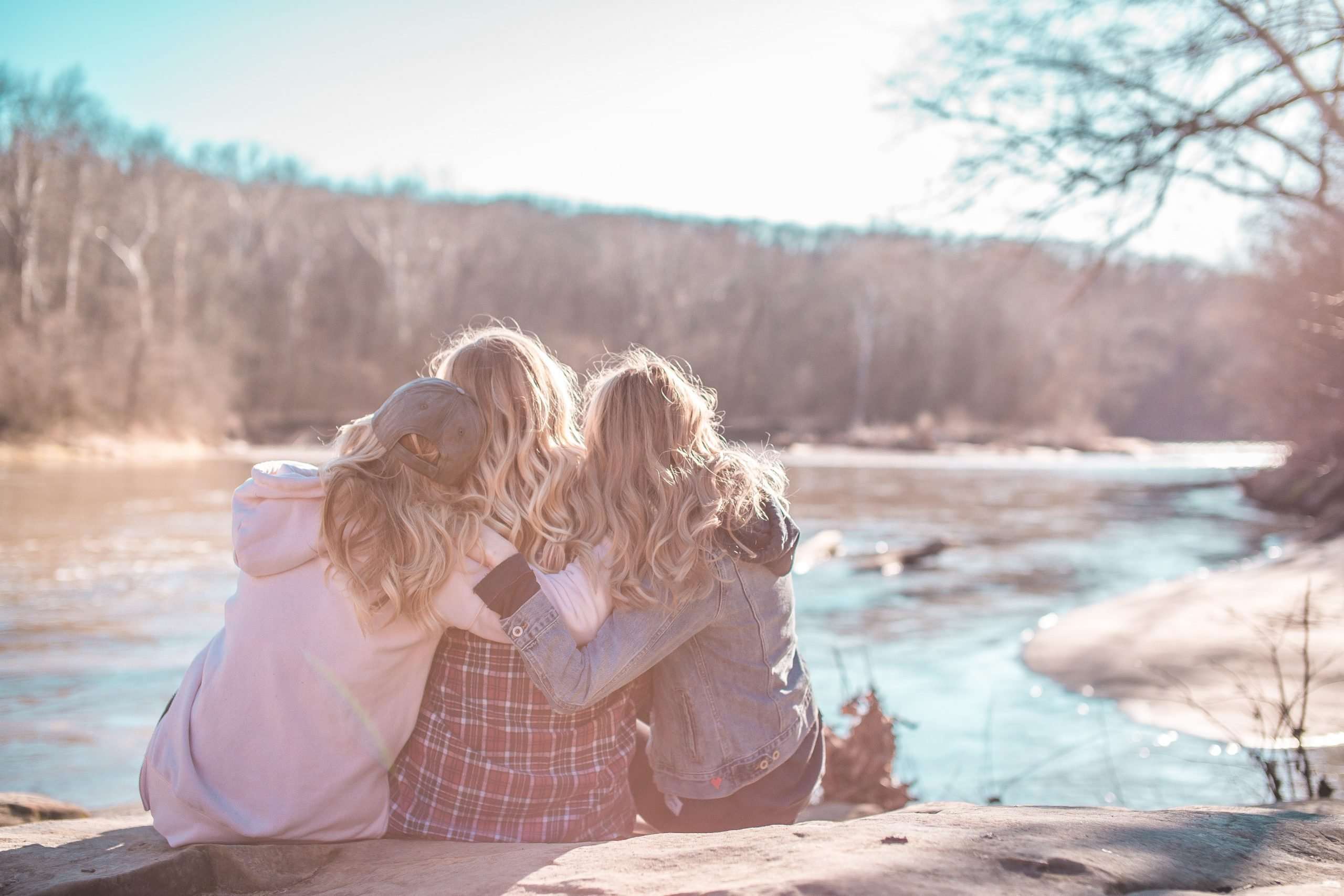 three-woman-from-behind-embracing