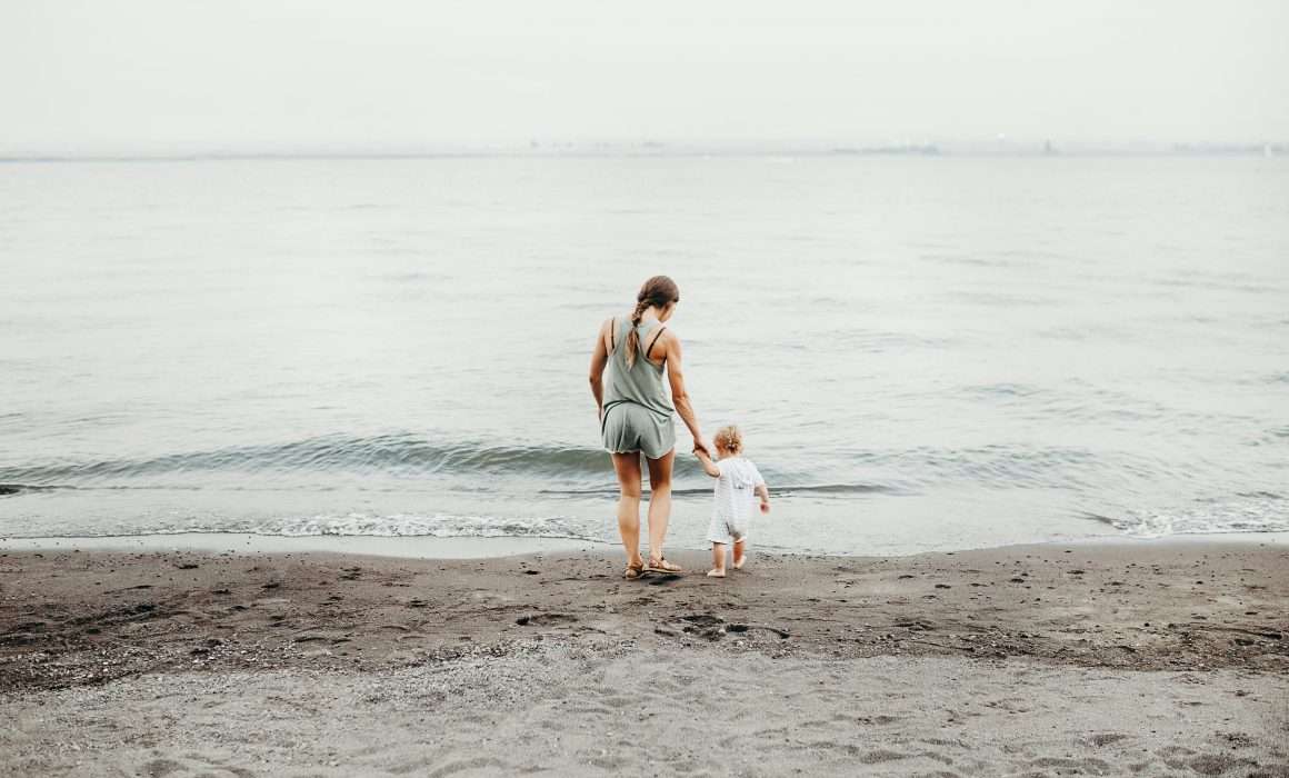 woman-and-baby-by-the-seaside