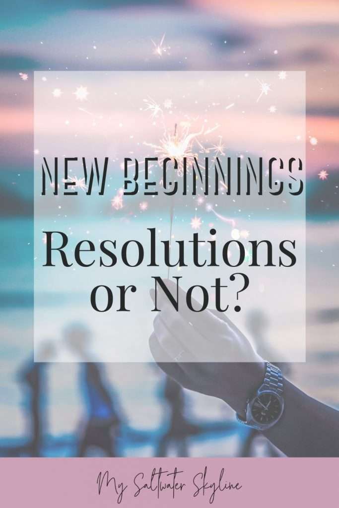 new-beginnings-pin-hand-holding-sparkler