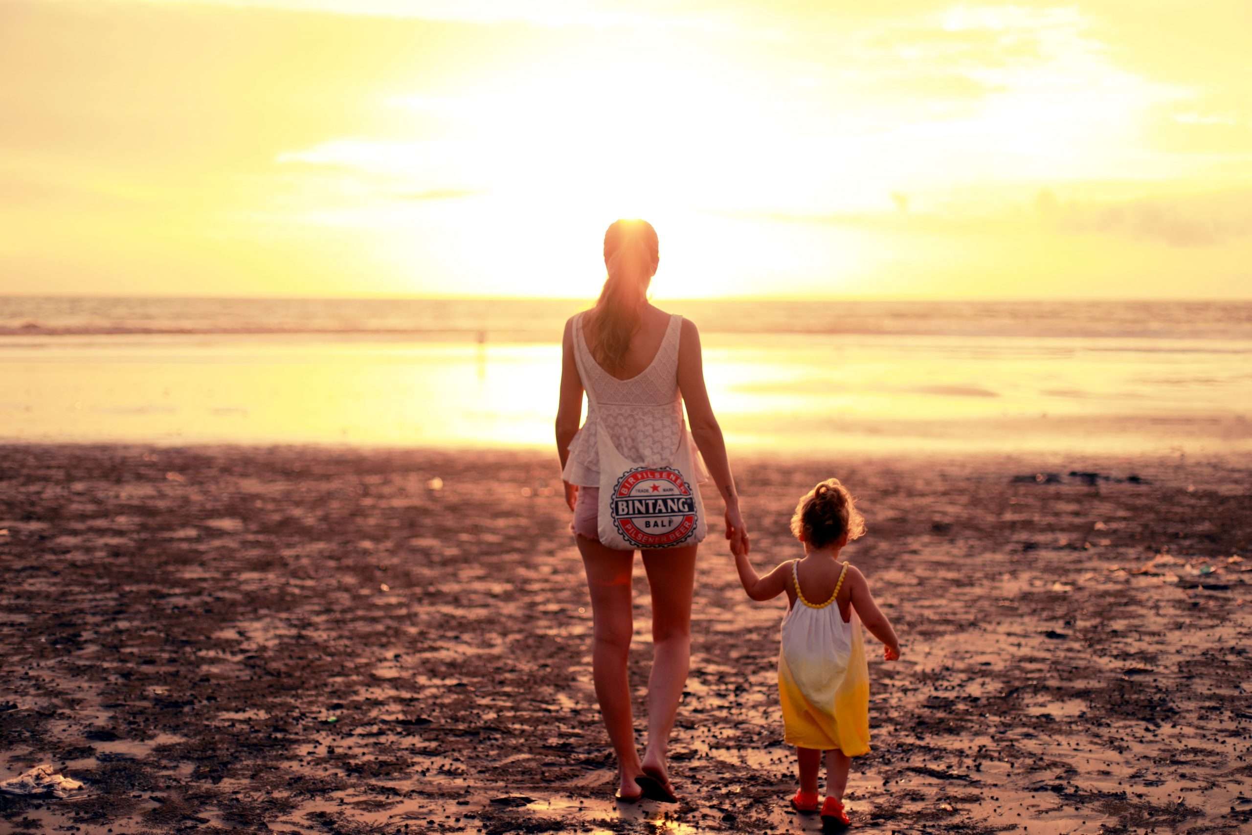 mother-and-daughter-on-beach-emotional