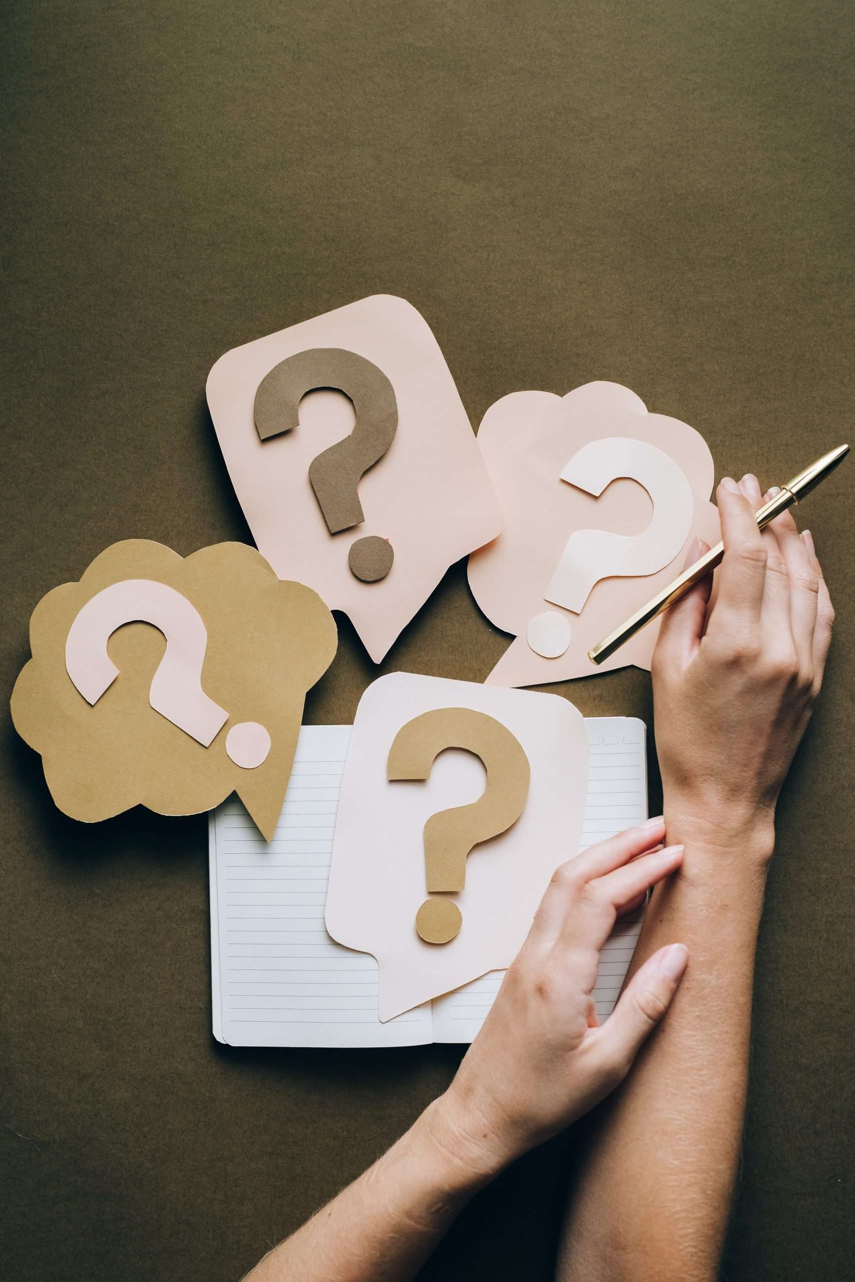 paper-questionsmarks-on-pink-background-question-everything-blog-post