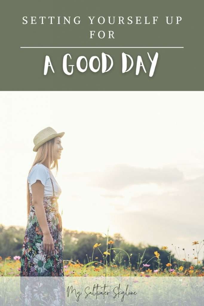woman-long-blonde-hair-straw-hat-standing-in-field-of-flowers-good-day-blog-post