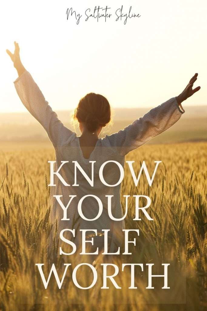woman-in-field-sunset-wearing-white-arms-outstretched-to-the-sky-know-your-worth-blog-post