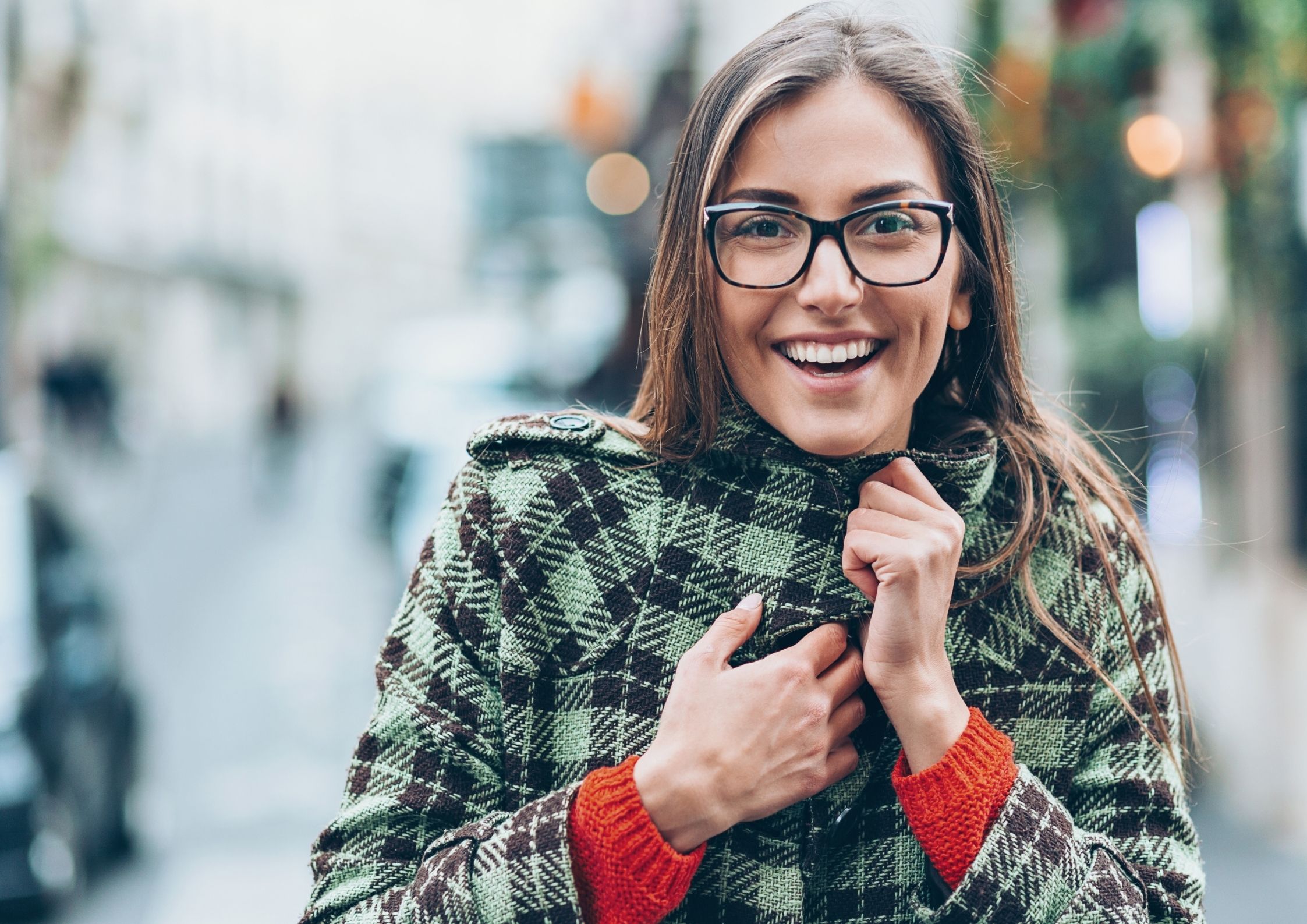 woman-on-street-checked-winter-coat-wearing-glasses-smiling-know-your-personal-values-blog-post