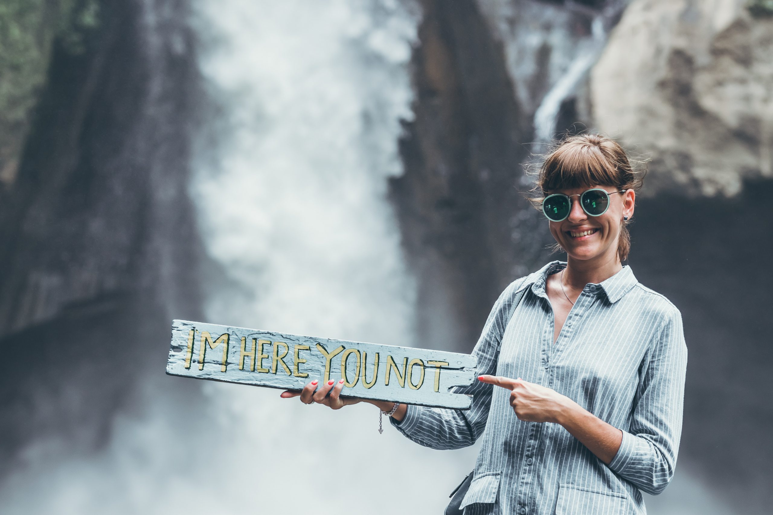 woman-holding-sign-i'm-here-you-not-is-jealousy-all-bad-blog