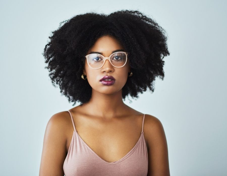 woman-curly-dark-hair-standing-firm-in-her-boundaries