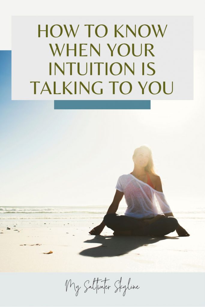 woman-on-beach-backlit-cross-legged-intuition-talking-to-you-blog-post