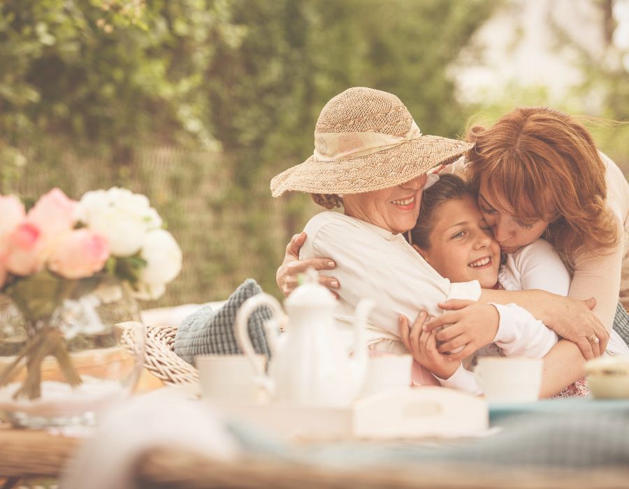 family-picnic-three-generations-hugging-love-is-the-answer-blog-post