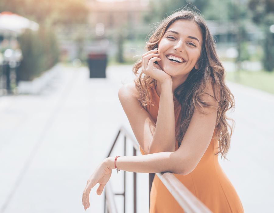 smiling-woman-outdoors-daily-self-care-blog