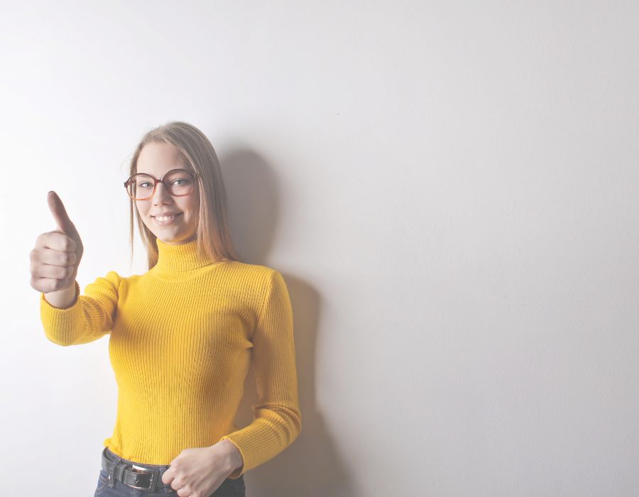 woman-yellow-shirt-giving-thumbs-up-do-your-best-blog-post