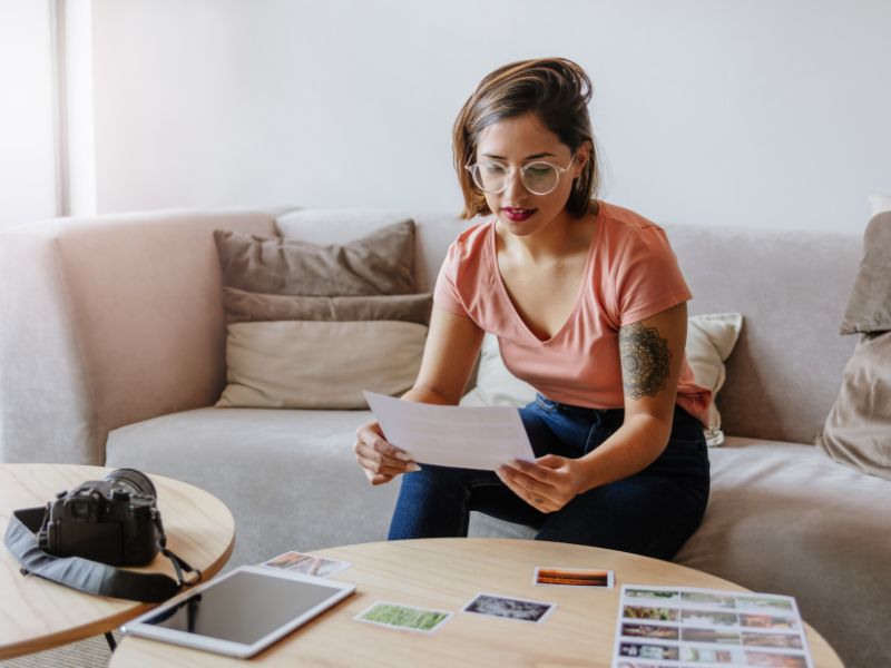 woman-at-couch-ideas-on-table-inspired-action-blog