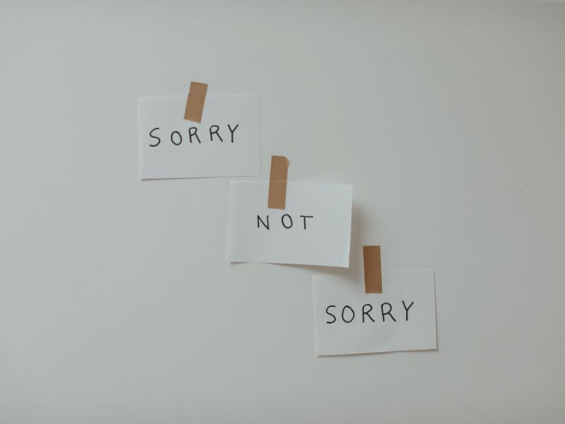 sorry-not-sorry-written-on-paper-stop-apologizing-blog-post