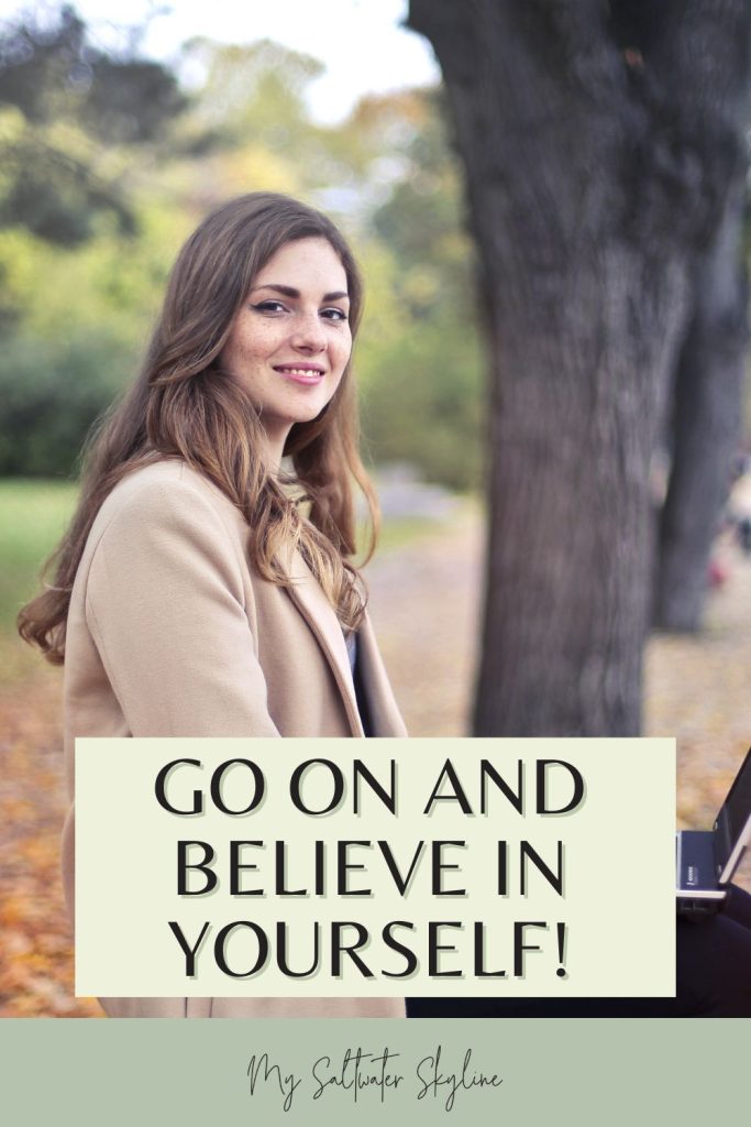 woman-on-park-bench-with-laptop-believe-in-yourself-pin